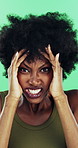 Face, woman and frustrated in studio with anger, bad news and overwhelmed with stress for challenge. Angry, black person and furious with problem, issue and crisis from mistake on green background.