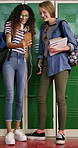 Laughing, phone and school with teen friends at locker in hallway for education or sharing memes. App, funny and learning with student girls in corridor for development, growth or study conversation