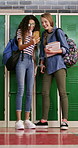 Teenager, students and laugh in high school with phone, social media post and browsing for online meme. Happy, young girls and friends by locker with tech, funny video and bonding together at recess.