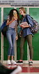 Girl, friends and laugh in high school with phone, social media post and browsing for online meme. Happy, young kids and teenager by locker with tech, reading funny joke or bonding together at recess