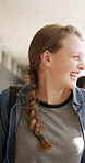 Happy girl, laugh and walking in hallway for class schedule, scholarship or study on campus. Conversation, chat and teenager with group of friends, bag or smile for education or learning in corridor