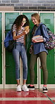 Teenager, friends and laugh in high school with phone, social media post and browsing for online meme. Happy, young kids and girls in hallway with tech, funny video and bonding together at recess.