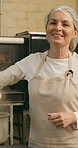 Mature, face and happy woman with pot in bakery for small business or food production. Portrait, female person or pastry chef with smile, apron or confidence for cooking or culinary art in factory