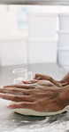 Hospitality, preparing or hands in bakery with dough, mixing or bread technique in food industry. Kneading, man or chef in kitchen with water, cuisine service or pastry production in culinary process