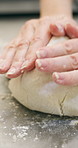 Hospitality, dough and hands in kitchen with kneading, baking or bread technique in food industry. Preparation, woman or chef with culinary process, cuisine service or pastry production in bakery.