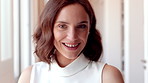 Happy, realtor and face of woman in home for property sale, commercial housing and rental listing. Business, real estate and portrait of person with pride, smile and ambition for homeowner consultant
