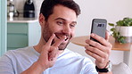 Video call, phone and man with sign language in home for communication, contact and connection. Happy, cellphone and person with I love you gesture for online conversation, chat and wave for hello