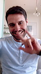 Video call, happy and face of man with sign language for communication, contact and online dating. Home, portrait and person with I love you gesture, blowing kiss and wave for conversation or chat
