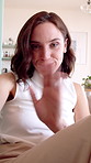 Face, woman and video call in living room with wave, connectivity or online communication on weekend. Happy, person relax and greeting in house with virtual contact POV, conversation and network.
