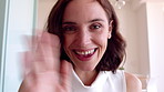 Woman, face and video call with wave in home for online surprise, communication or conversation. Portrait, female person or talking with shock or smile for gossip, good news or virtual chat in house