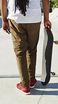 Skateboarding, start and legs outdoor with action, stability control and riding technique in fitness hobby. Back, man or skater with board, mobility performance and balance skills in Los Angeles.
