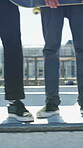 Skating, fitness and legs of friends on ramp in skatepark for extreme sports, agile tricks ot balance. Skateboard, grind technique and culture with shoes of people outdoor for urban and street league