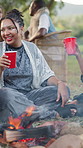 Drinks, friends and relax at festival by fire, social gathering and laughing together outdoor. Party, group and people with alcohol at event, happiness and hangout with funny joke for celebration