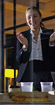 Night, applause and business people in glass office with high five, success and financial audit goals. Late, woman and team clap with celebration, finance achievement and fist pump for collaboration.
