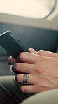 Commute, text or hands in bus with phone, online communication or internet search in morning travel. Digital, typing or man in transportation with tech, message update or networking at start of day.