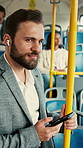Businessman, commute and phone on bus with earphones, streaming music or travel to work destination. Worker, person and audio tech on public transport with journey, radio song or handrail for balance