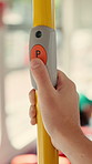 Press, hands or person with button in bus for travel, passenger destination or stop request for transit. Public transport, commute or traveler with signal for journey end, push or drop off location