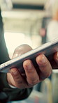 Hands, mobile and passenger in bus for travel, typing message and check notification for contact. Phone, public transport and person on internet for journey update, connection and morning commute