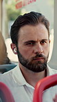 Travel, passenger and businessman with earphones in bus, thinking and listening to music on journey. Serious, employee and person with tech for commute, public transportation and streaming audio