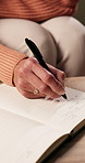 Writing, home and hands of woman with book for to do list, reminder and schedule for planning. House, notebook and mature person with checklist to remember daily tasks, agenda and goals in diary