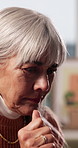 Gambling, frustration and unhappy old woman in home, regret and thinking of financial loss in lounge. Retirement, reflection and senior person with betting addiction, sad and stress for debt in house