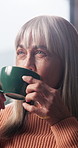 Happy, home and senior woman with drink on sofa for reflection, wondering and nostalgia. Relax, house and mature person with beverage, coffee or tea for calm, peace and inspiration for wellness