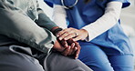Healthcare, comfort and nurse with old person, holding hands and consultation in hospital or empathy. Clinic, medical professional and explaining diagnosis to elderly patient, support and senior care