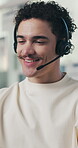 Headset, smile and man with call center for communication, customer service and discussion. Happiness, problem solving and friendly agent or consultant talking for advice, solution or virtual support