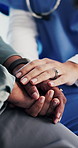 Nurse, hands and comfort with patient for empathy, breaking news or understanding in hospital. People, healthcare worker or touch with client for cancer diagnosis, feeling or sympathy in hospital