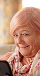 Reaction, phone and senior woman in home for online chat, communication and social network. Retirement, happy and elderly person on cellphone for connection, message and notification on internet