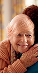 Hug, nurse and senior woman in nursing home for empathy, care and bonding for medical support. Retirement, healthcare and caregiver with elderly patient embrace for affection, comfort and compassion