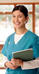 Tablet, woman and face of nurse in nursing home with confidence for career in medical service. Happy, digital technology and portrait of female healthcare worker with pride for about us at facility.