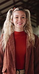 Smile, education and face of woman at university with confidence for study scholarship. Happy, knowledge and portrait of female student in hallway with pride for future or college goals on campus.