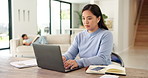 Laptop, notebook and businesswoman in home with remote work for finance report with budget plan. Typing, freelancer and Asian female financial advisor on computer for email on investment proposal.