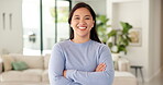 Smile, confident and face of woman in home for real estate, apartment or living room. Happiness, arms crossed and portrait of homeowner or person in lounge or house for property or mortgage