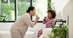 Teaching, child and mom with brushing teeth in bathroom for fresh breath, bonding and oral hygiene. Home, learning and woman or kid with toothbrush for dental care, cleaning and morning routine