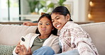 Happy, girls and silly face with selfie on sofa for funny picture or social media post in home. Children, sisters or siblings with goofy expression for humor, comedy or photography together in house