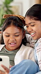 Relax, laugh and girls with phone in living room for online entertainment, watching cartoons or movie. Family home, siblings and happy kids with tech for streaming videos, bonding and humor or comedy