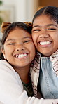 Care, face and kids hug in home for support, bonding and connection together with happy sisters. Children, siblings or girls embrace at family house with smile for trust, safety or security with love
