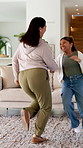 Dance, holding hands and mother with girl in lounge, family fun and laughing for healthy relationship. Support, happy woman and child with music for bonding, moving together and funny joke in home
