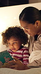 Mother, relax and reading book with child in bedroom for education, fantasy novel and bedtime routine. Night, woman and daughter with fairytale story, language development and storytelling at house