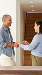 Smile, dance and couple in home with music, fun or bonding together in living room with energy. Happy, love and man with woman for moving to playlist, album or radio for entertainment in apartment