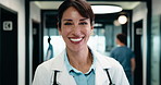 Face, doctor and woman with confidence in clinic, professional and laughing for healthcare career. Portrait, happy and mature physician with pride for medical expertise, wellness support and about us