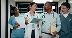 Tablet, walking and medical team at clinic for planning, schedule discussion or insurance documents. Hospital, people or doctors with tech for healthcare report, advice or help with nurses in hallway
