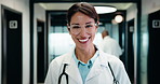 Face, doctor and woman with laughing in hospital, professional and confidence for healthcare career. Portrait, happy or mature physician with pride for medical expertise, wellness support or about us