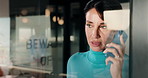 Cafe, window and disappointed woman with call fail, delay or crisis for delivery service. Phone, block and small business owner with stress, frustrated or worried for late stock or supply chain
