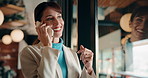 Phone call, discussion and businesswoman by window in office for communication, talking or negotiation. Happy, cellphone and mature female financial manager on mobile conversation for investment.