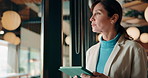 Cafe, window and businesswoman with tablet, idea and brand manager with creative choice and planning. Remote work, decision and mature person with tech for project, happy or digital marketing in shop