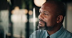 Thinking, space and black man by glass for business strategy, financial decision and investment. Office, corporate and mature person with idea for finance proposal, problem solving or budget solution