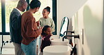 Parents, hug and children with brushing teeth in bathroom, dental hygiene and support for grooming. Teaching, embrace or happy people with girls for oral care, interracial family or thumbs up in home